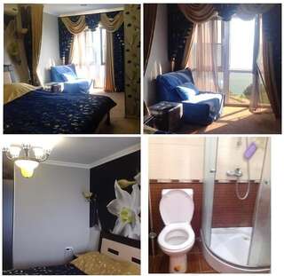 Гостевой дом Guesthouse Maria Гагра Стандартный трехместный номер с видом на море-1